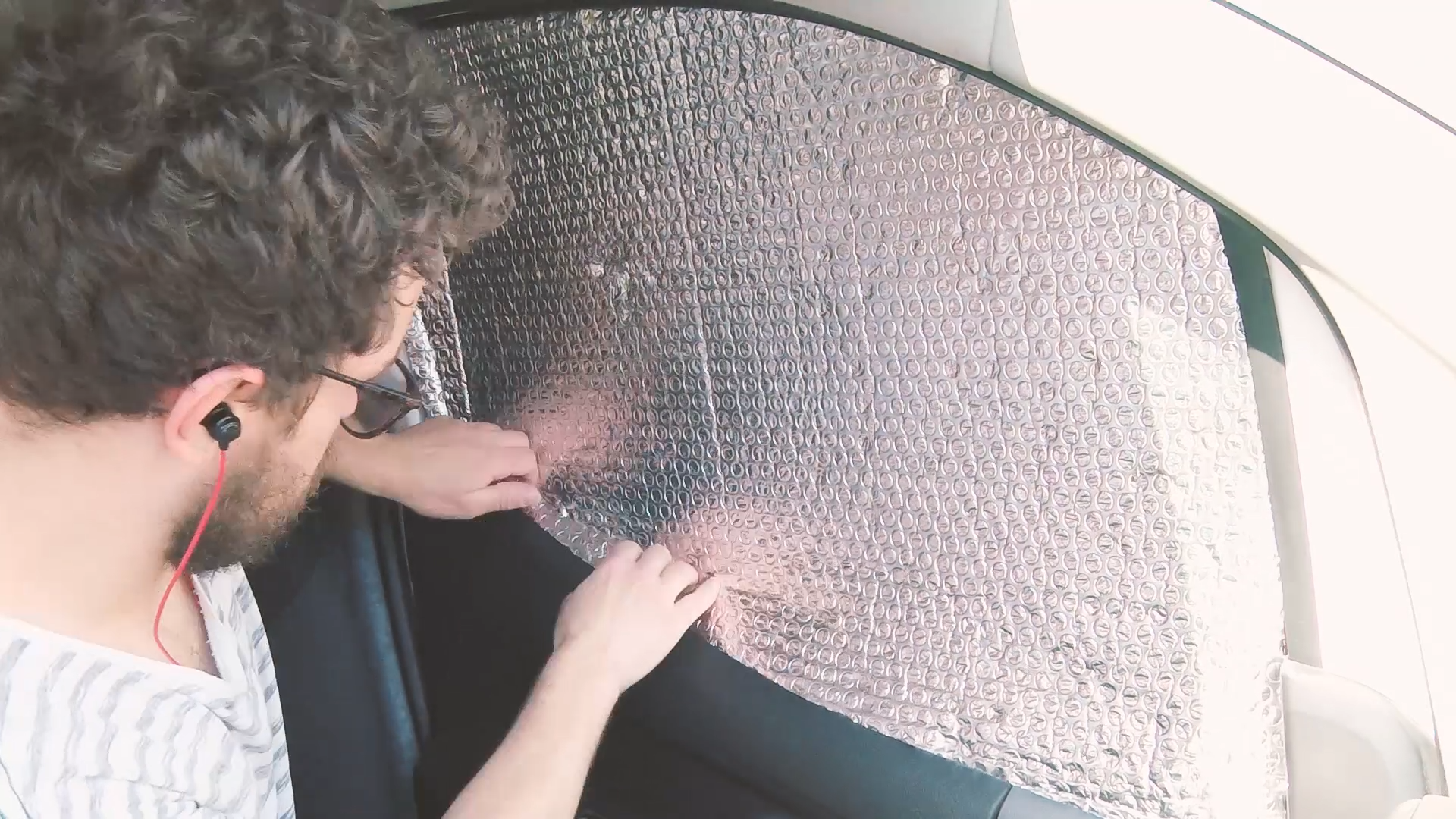 Checking the fit of the foil insulation window cover