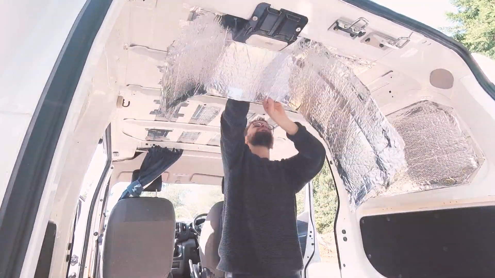 Removing previous foil bubble wrap van ceiling insulation
