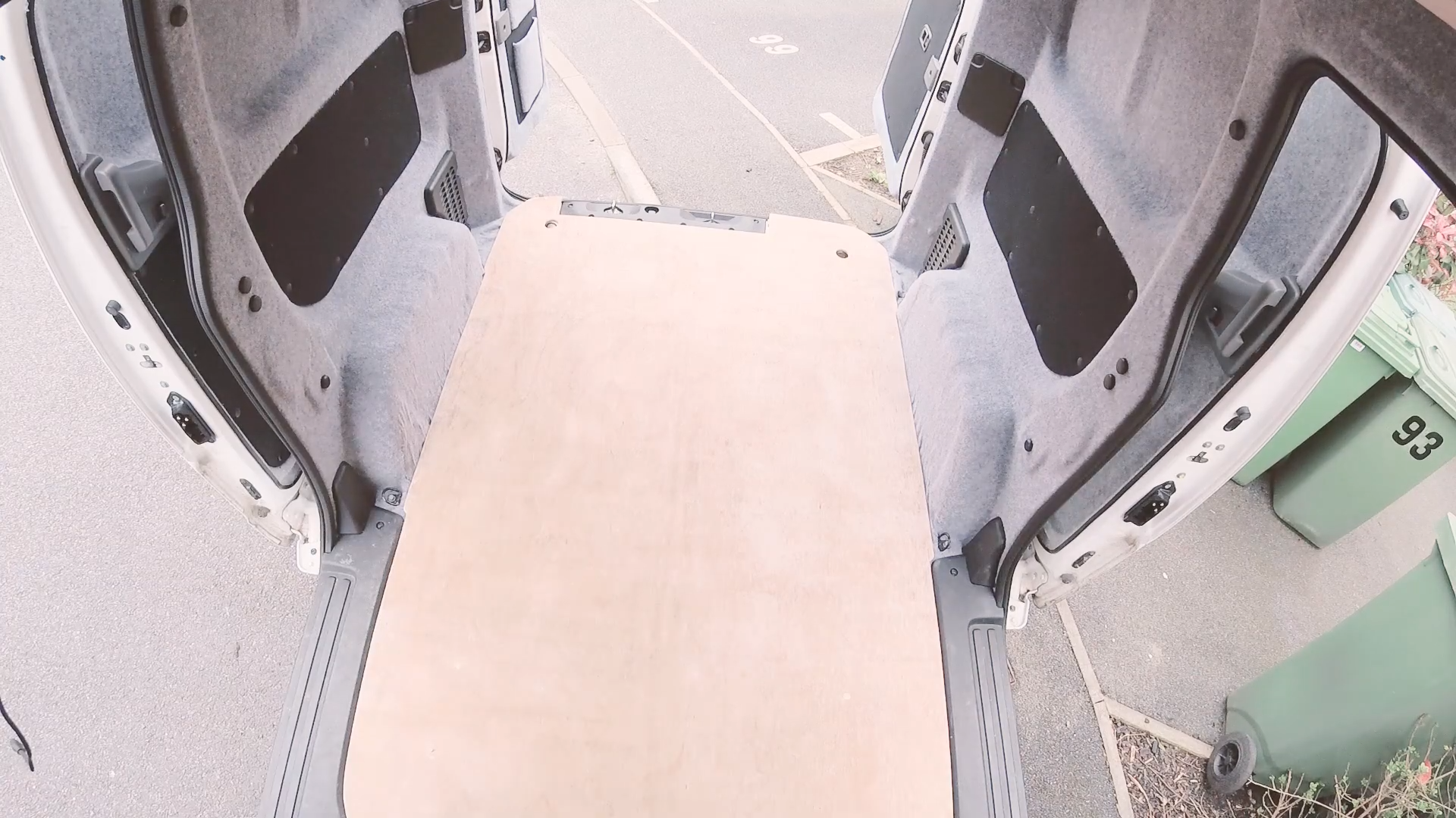 The sanded plywood floor fitted back in the van