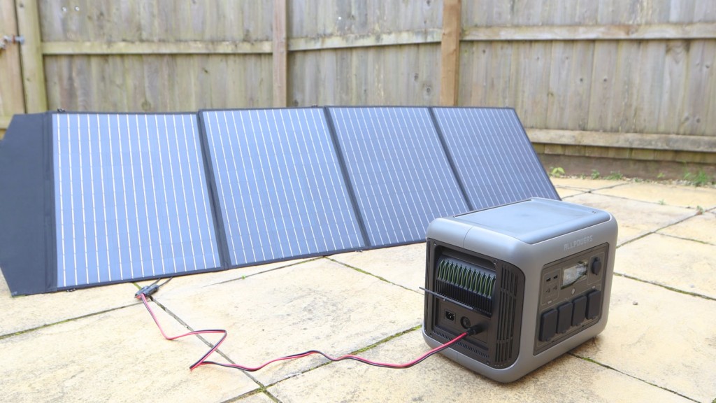 The AllPowers R1500 1800W Portable Power Station And unfolded SP-033 200W folding solar panel